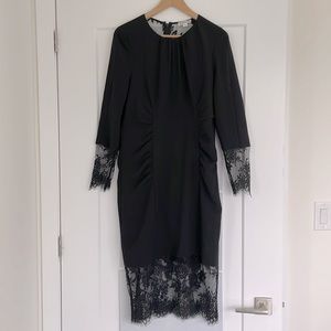 Black lace fitted midi dress. Whistles size 10. Worn once. Ruched to flatter.